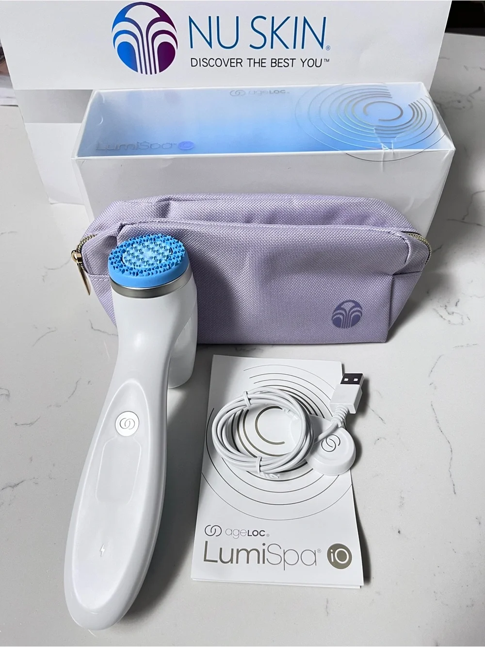 Nu Skin ageLOC LumiSpa iO Facial Cleansing Device in White with Lavender Pouch